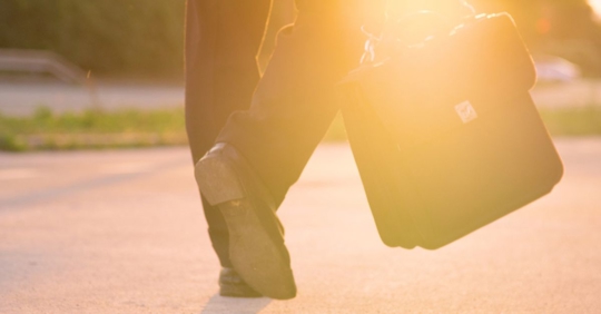 a worker walking to work